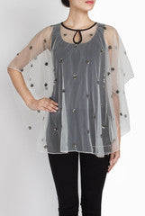 Ridhi Arora White Net Poncho With Black Small Bootis