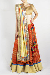 Sugarlips by Sakina Amin Orange & Golden Lehenga Choli